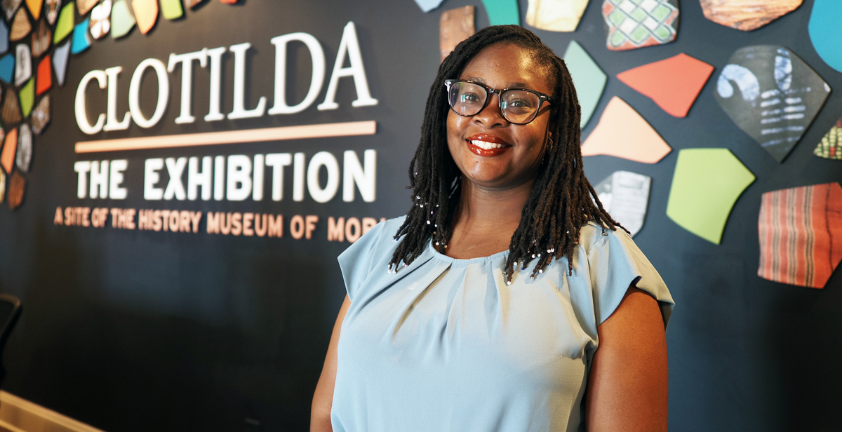 Jessica Fairley, a 新澳门六合彩开奖记录 communication graduate, manages the Africatown Heritage House museum, which welcomed its first guests this week.